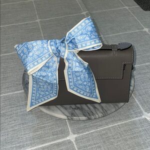 Silky light blue paisley design handbag tie or hair tie